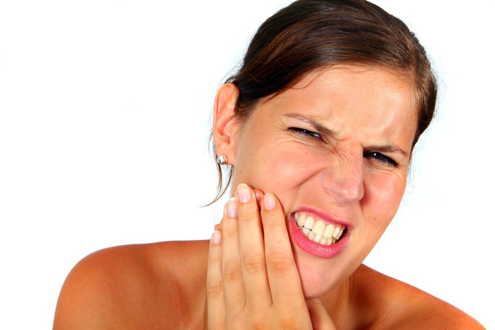 Dấu hiệu và triệu chứng mọc răng khôn ở người lớn